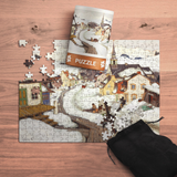 Jigsaw puzzle with a completed section on a wooden surface, accompanied by a black drawstring bag.
