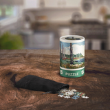 Puzzle packaging with scattered pieces on a wooden table