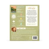 Village-themed product packaging with branding and text on a white background