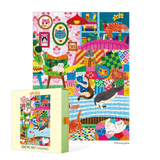 Colorful puzzle with cat-themed design and matching box on a white background