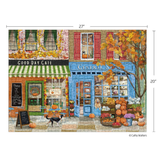 Jigsaw puzzle of a quaint town street with a General Store and Cafe, featuring pumpkins and autumn decorations.