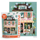 Jigsaw puzzle packaging with a colorful illustration of a flower shop and 'Snax Size' branding.