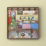 Framed artwork of a colorful kitchen scene with various objects and a red door.
