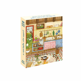 Jigsaw puzzle box with a kitchen scene illustration on a white background