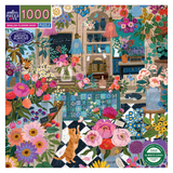 Floral-themed puzzle packaging with a colorful flower shop illustration.