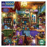 Colorful puzzle box featuring a detailed kitchen scene with various objects and a cat.