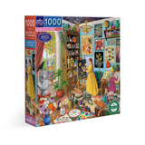 A 1000-piece jigsaw puzzle box by Super Picnic Live, featuring a colorful, detailed illustration of an art studio filled with painters, flowers, plants, and creative tools.