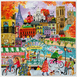 A colorful jigsaw puzzle depicting a Parisian street scene with the Eiffel Tower, Notre Dame Cathedral, a metro station, cyclists, pedestrians, boats on the Seine, and autumn trees in the background.