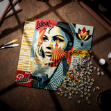 A completed and partially assembled jigsaw puzzle featuring a stylized portrait collage with vintage text elements, photographed on a brown leather-like surface with scattered loose puzzle pieces and a few small paintbrushes nearby.