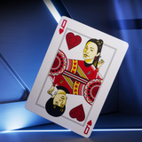 A stylized playing card featuring an illustrated female crewmember in a red and gold Star Trek uniform, with red hearts and corner numerals, shown floating against a blue-lit futuristic background.