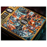 Star Wars themed jigsaw puzzle box featuring a detailed collage of iconic space battle scenes with Darth Vader, Stormtroopers, and other galactic characters, framed by ornate gold borders.