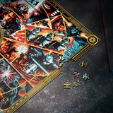 A partially assembled Star Wars themed jigsaw puzzle with a detailed comic-style space battle scene, shown on a dark textured surface with a few loose puzzle pieces nearby.