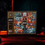 A Star Wars themed jigsaw puzzle box displayed on a dark, atmospheric surface with red ambient lighting. The box features a highly detailed, colorful collage of Star Wars characters and scenes, with 'STAR WARS' branding on the left side.