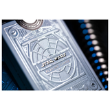 Close-up of a Star Wars Playmat Deck box with embossed sci-fi panel details, featuring the Star Wars logo and a circular seal, shown against a dark blue and black background with blurred blue lights.