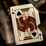 Jack of Spades playing card with a pen on a dark background